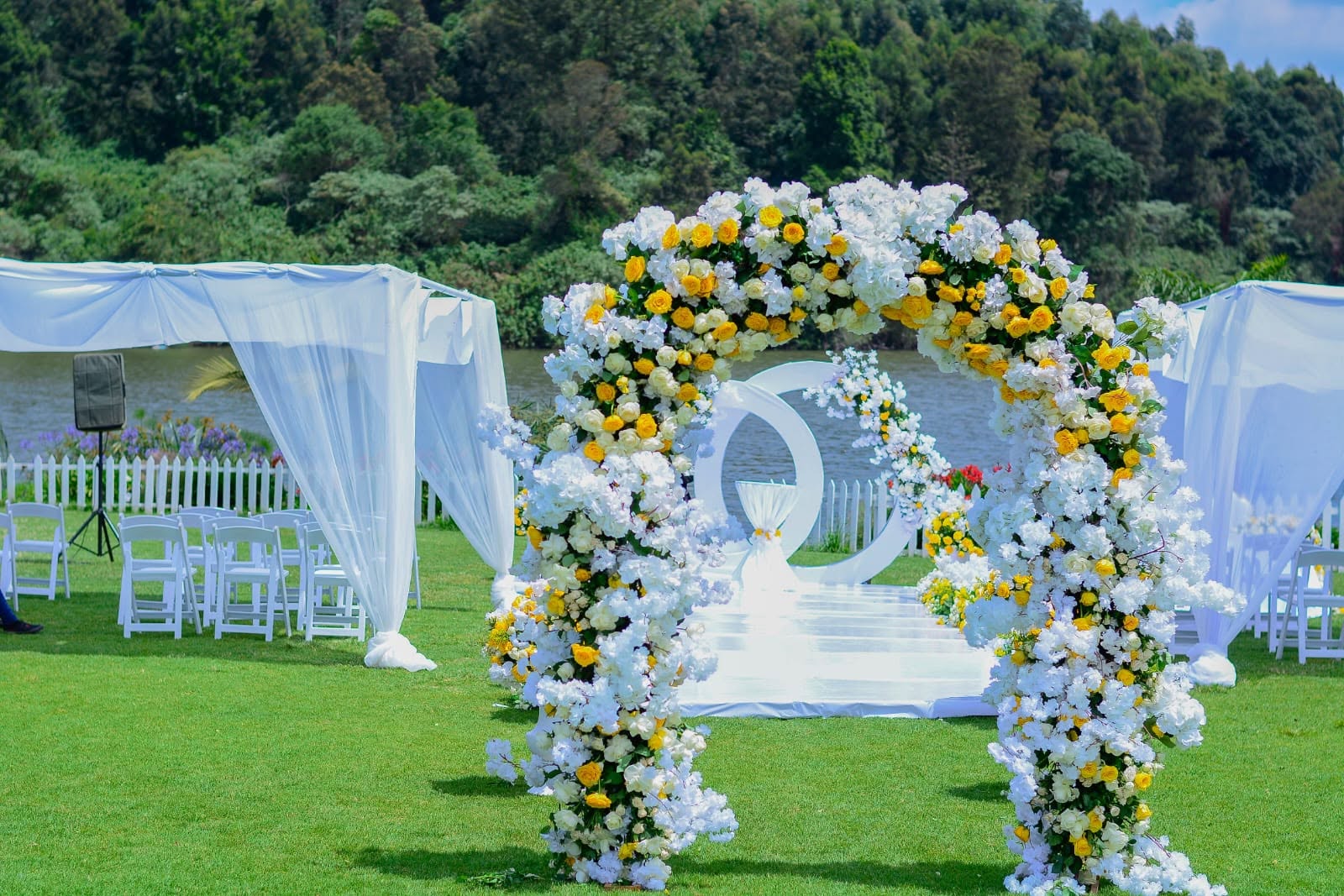 Ceremonies — Lakeside floral arch